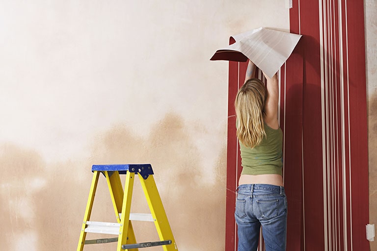 wallpaper hanging specialist of OnTime Painting Services Dubai 1